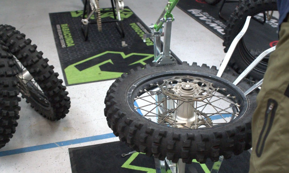 Portable dirt bike tire changer setup for fast and easy motorcycle tire changes