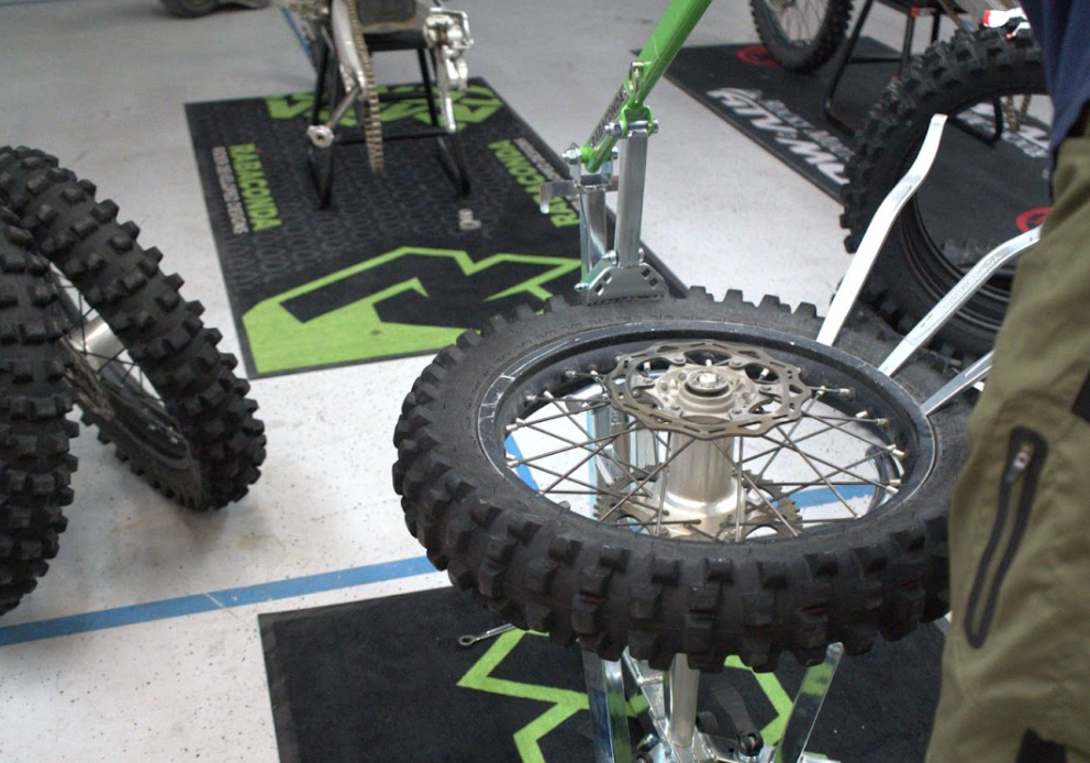 Portable dirt bike tire changer setup for fast and easy motorcycle tire changes