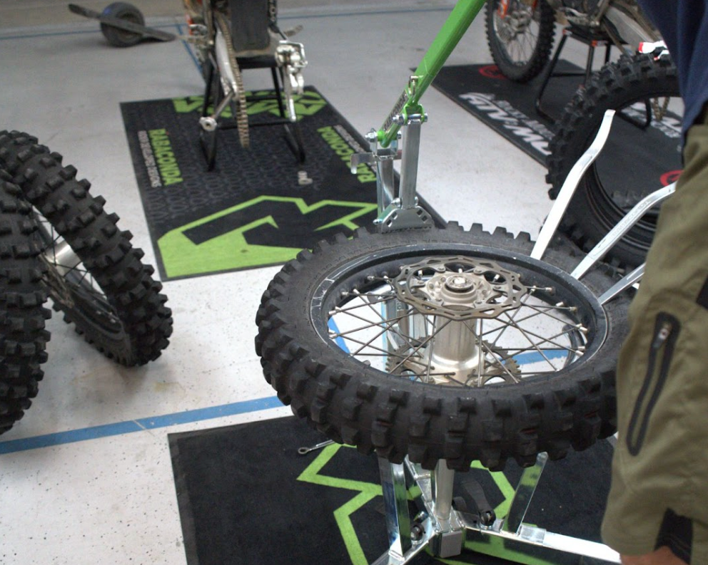 Portable dirt bike tire changer setup for fast and easy motorcycle tire changes