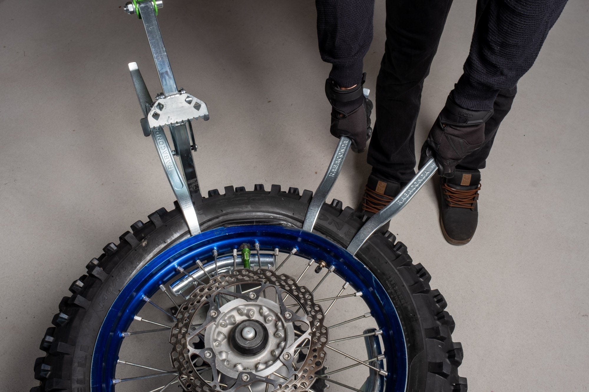 Portable dirt bike tire changer set up at home for smooth, hassle-free tire changes